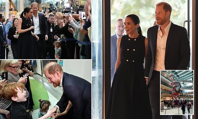 Harry and Meghan are given a heartwarming reception as they visit a children's hospital on the first stop of whirlwind four-day tour in Australia